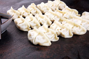 Fototapeta na wymiar Gyoza or dumplings snack with soy sauce.