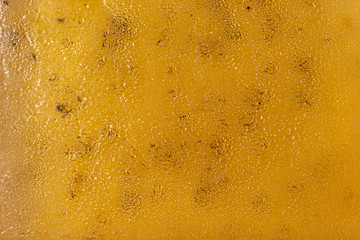 juicy appetizing marmalade of yellow kiwi with pits close-up. sweet background
