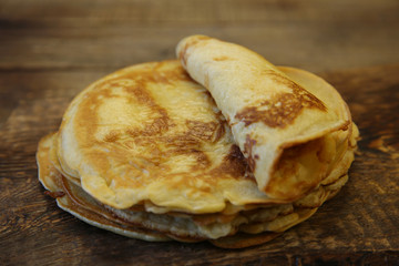 close-up homemade pancakes on a wooden rustic board