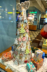  Gingerbread Christmas tree, confectionery shop window, night in the new year.