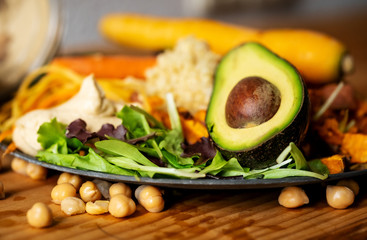 Fresh salad for a healthy lifestyle with avocado, beens, rice and carrots