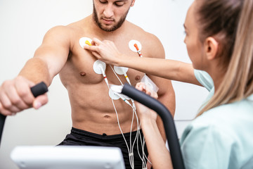 Male athlete does a cardiac stress test