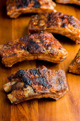 Pork BBQ Ribs. Traditional classic american barbecue staple. Pork ribs seasoned with a dry rub and slow smoked over mesquite wood chips served with homemade bbq sauce. 