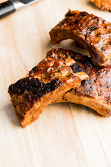 Pork BBQ Ribs. Traditional classic american barbecue staple. Pork ribs seasoned with a dry rub and slow smoked over mesquite wood chips served with homemade bbq sauce. 