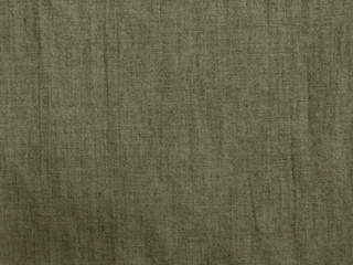 Gray green fabric texture. Rough cotton fabric background. Texture of natural coarse fabric. Grunge texture backdrop. Abstract khaki background. Burlap sack.