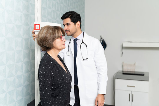 Elderly Woman Visiting Doctor For Regular Checkup