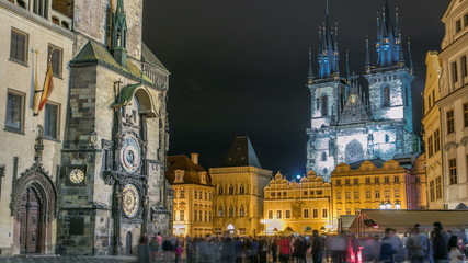 Fototapeta na wymiar Night time illuminations of the the Old Town Hall timelapse, Town Square and fairy tale Church of our Lady Tyn