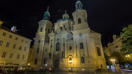 Fototapeta na wymiar The Church of St. Nicholas night timelapse in Prague, Czech Republic