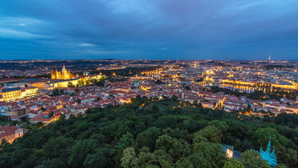 Obraz premium Wonderful day to night timelapse View To The City Of Prague From Petrin Observation Tower In Czech Republic