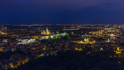 Fototapeta na wymiar Wonderful night timelapse View To The City Of Prague From Petrin Observation Tower In Czech Republic