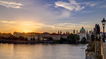 Naklejka premium View from Charles Bridge in Prague during the sunrise timelapse, Bohemia, Czech Republic.