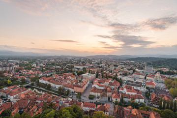 Fototapeta premium Aerial view of the sunset cityscape in Ljubljana, Slovenia