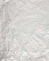 white sheet of paper battered with texture