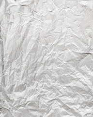 white sheet of paper battered with texture