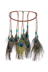 Subject shot of a brown suede hair hoop with dangling cords, peacock feathers and green and blue...