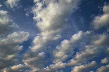Beautiful, spring clouds in the blue sky, which portend the change of weather.
