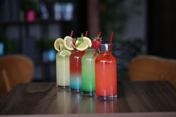 colorful fruit cocktails on table