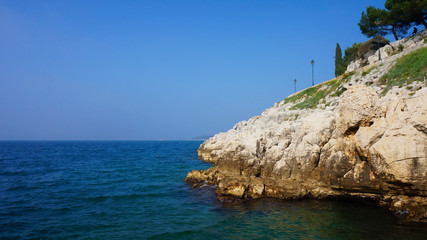 Naklejka premium Adriatic sea coast with hills in Rovinj, Croatia
