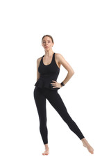 Fototapeta na wymiar Slender girl gymnast in black sportswear with Isolated on a white background.