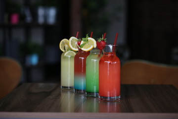 colorful fruit cocktails on table