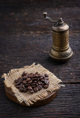 Coffee beans on wooden table.copy space.