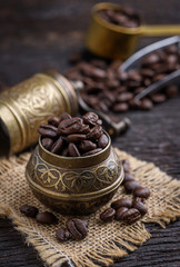 Coffee beans on wooden table.copy space.