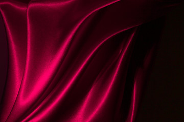 Fototapeta na wymiar Beautiful satin drapery. Satin pink fabric. Abstract design.