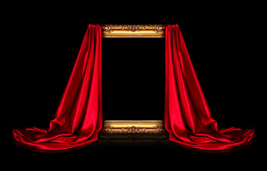 The wooden frame for the picture is covered with a silk red cloth isolated on a black background....