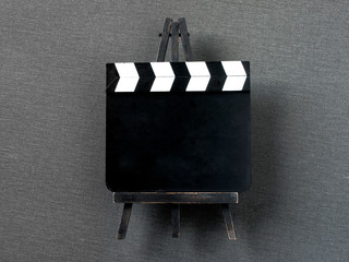 Clapperboard. Filming equipment.
