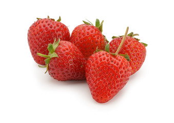 Isolated strawberry. Five  whole fresh red strawberry fruit isolated on white background.