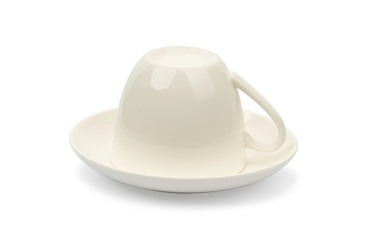 Coffee cup upside down on saucer isolated on white background  with clipping path.