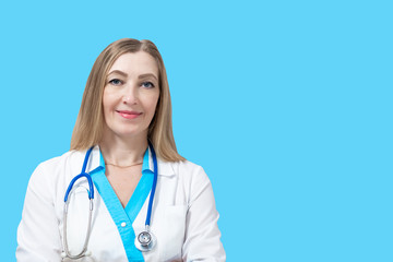 female doctor with blond hair and stethoscope, waist-high portrait