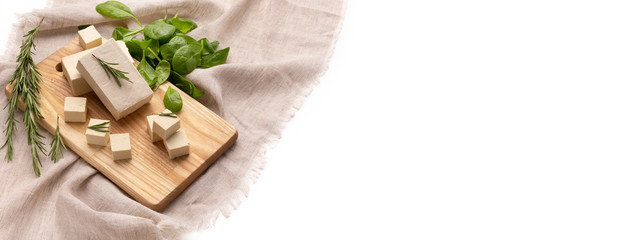 Italian vegetarian cuisine. Baby spinach, rosemary and tofu