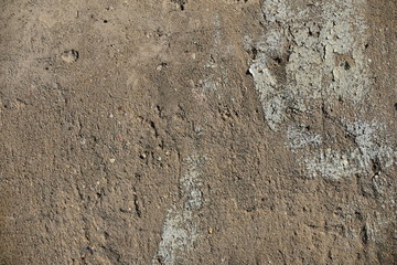 Cement wall with cracks in industrial building, surface for your design and texture background.