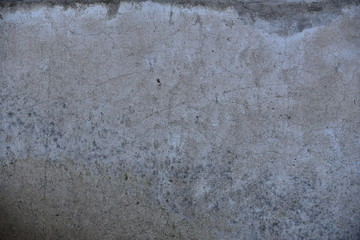 Cement wall with cracks in industrial building, surface for your design and texture background.