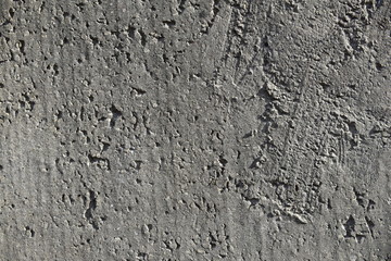 Cement wall with cracks in industrial building, surface for your design and texture background.