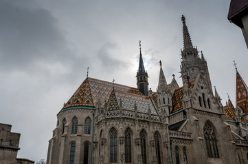 Fototapeta na wymiar Matthias Church on Buda Castle Hill a rainy winter day
