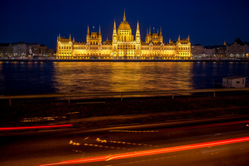 Fototapeta na wymiar long exposure picture of Hungarian Parliament in Budapest with Danube at dawn