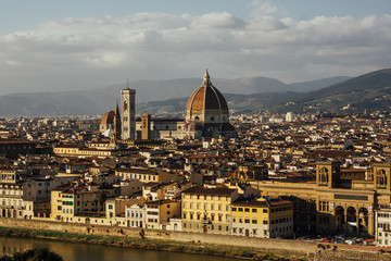 Fototapeta na wymiar Panorama of historical center of Florence from Piazzale Michelangelo. Panorama at Duomo. Fantastic view of Florence in Italy with Arno River and the Cathedral with the big dome. 