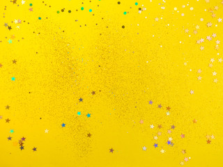yellow background with colorful confetti
