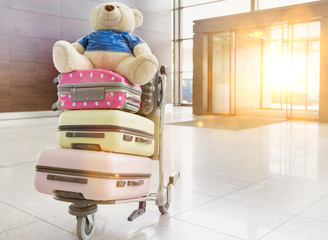 Photo of baggage on cart with lens flare