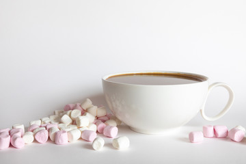 Marshmallow with coffee or hot chocolate on a white background, sweet food background