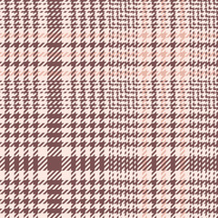 Seamless glen plaid pattern. Fabric texture in pink for jacket, coat, skirt, trousers, blanket, or other modern fashion textile print. Background for autumn, spring, and winter clothing fabric design.