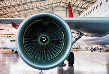 Close up of airplane engine in airport