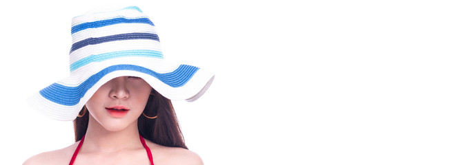Cute asian woman in red bikini, summer hat and jeans isolated in white background. Hat is hiding her face. Sexy summer concept. Banner frame.