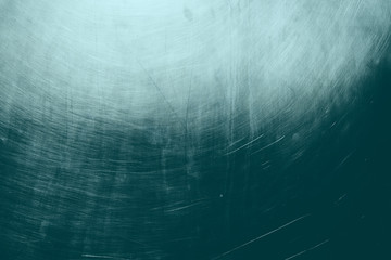 metallic blue grungy background with spotlight