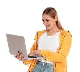 Beautiful woman using laptop on white background