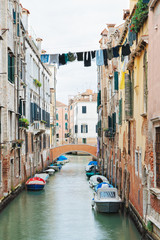 Fototapeta na wymiar Random canal in Venice with washing lines