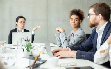 Business meeting. International team having conference in office