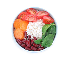 Tasty rice with beans and vegetables isolated on white, top view
